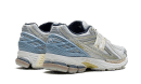 1906R Kith White Blue